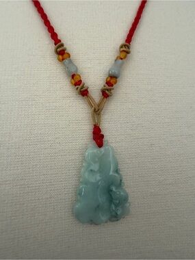 Handcrafted Celadon Jade Pendant Necklace with Red Cord